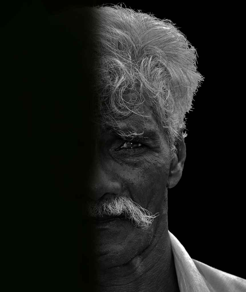 A monochrome portrait of an Old Shepherd man with wrinkled face from Pollachi, Udumalai, Tamilnadu. Nikon 